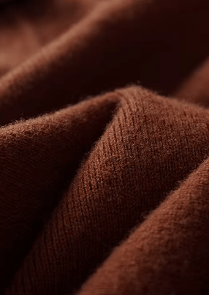 MERINO WOOL RIBBED BUTTONLESS POLO