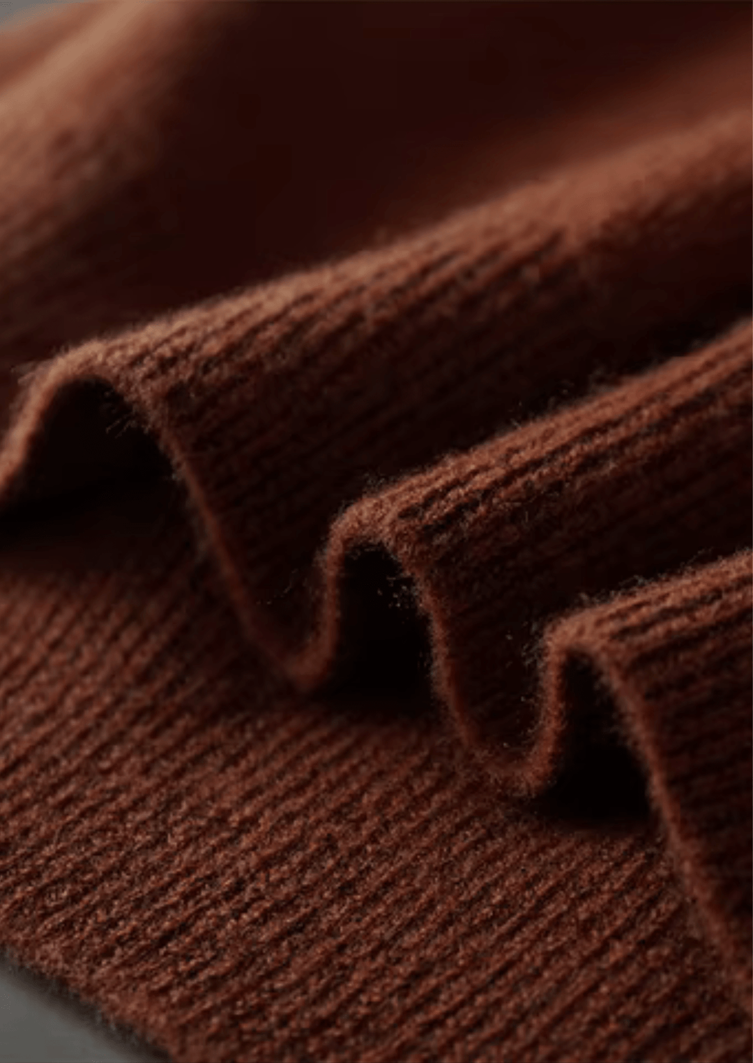 MERINO WOOL RIBBED BUTTONLESS POLO